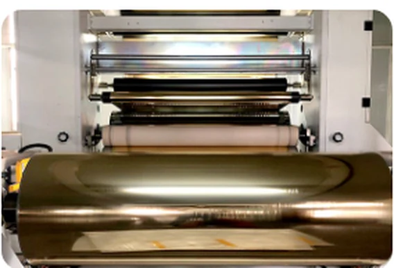 UV-curable adhesive being applied on a coating line for cold foil transfer