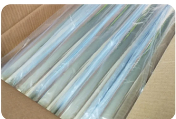 Finished cold foil rolls wrapped and packed for export shipment