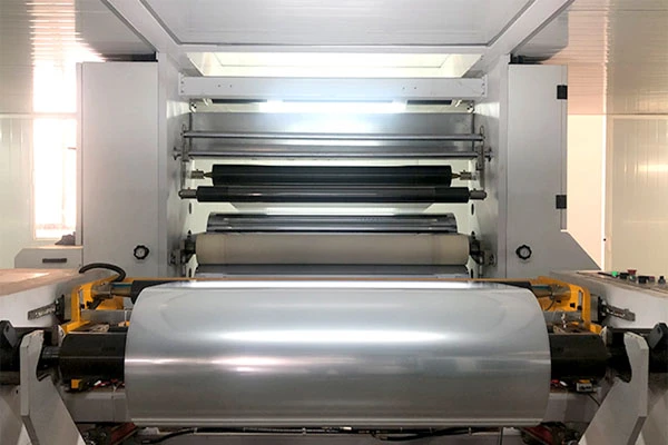 Release-layer coating line applying release chemicals onto PET carrier film