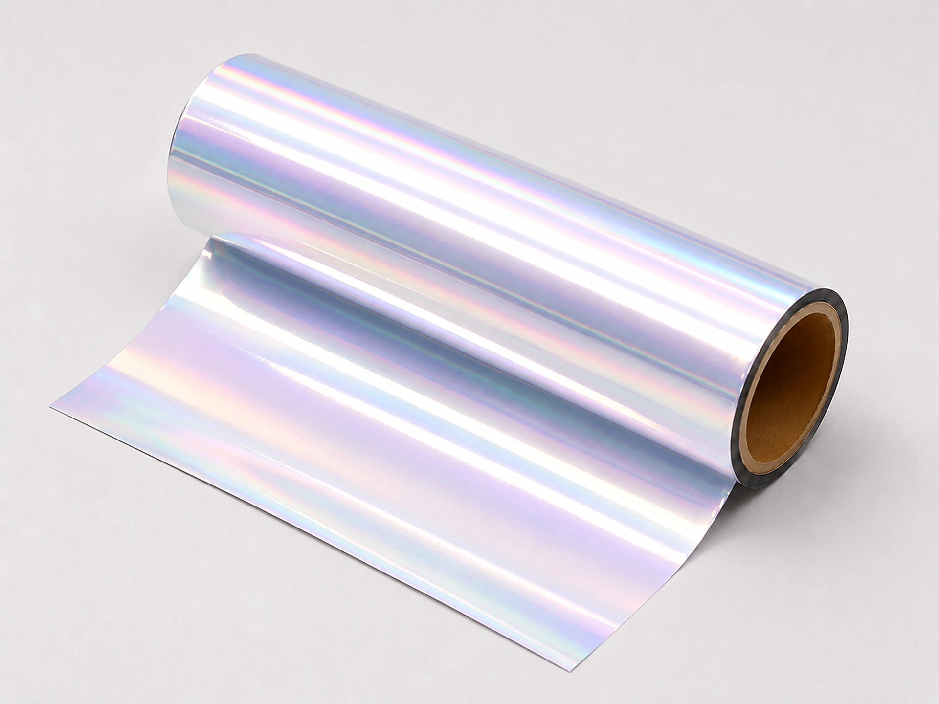 Iridescent Pearl cold foil web unwinding from master roll showing consistent pearlescent coverage edge to edge